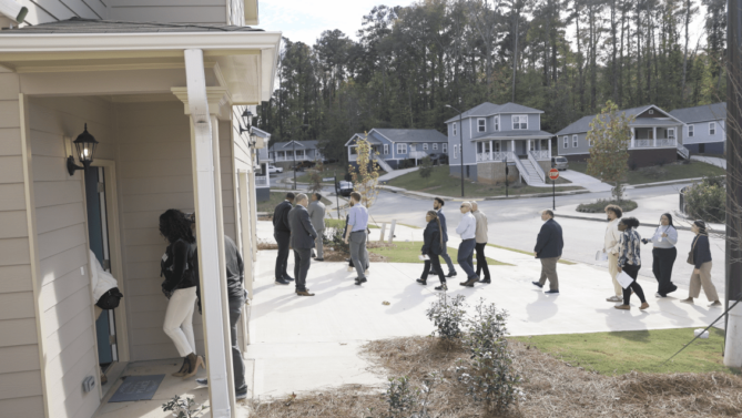 Enterprise Community Leadership Council on a housing tour