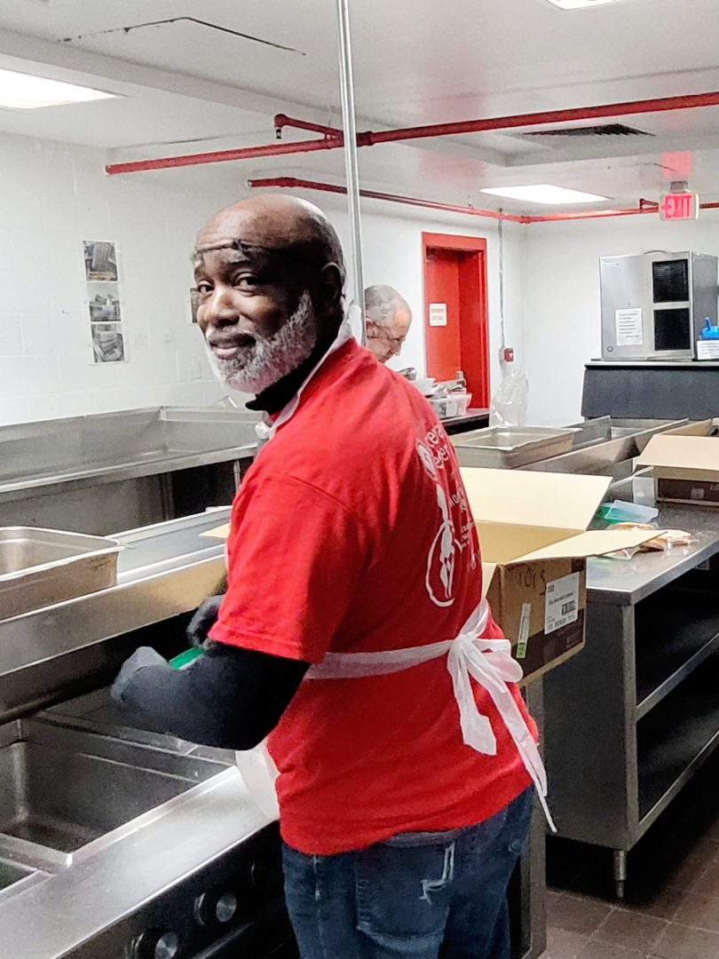 Titan 100 Day of Service at the Gateway Center with 3Keys President/CEO Scott Walker volunteering to prep meals for individuals experiencing homeless